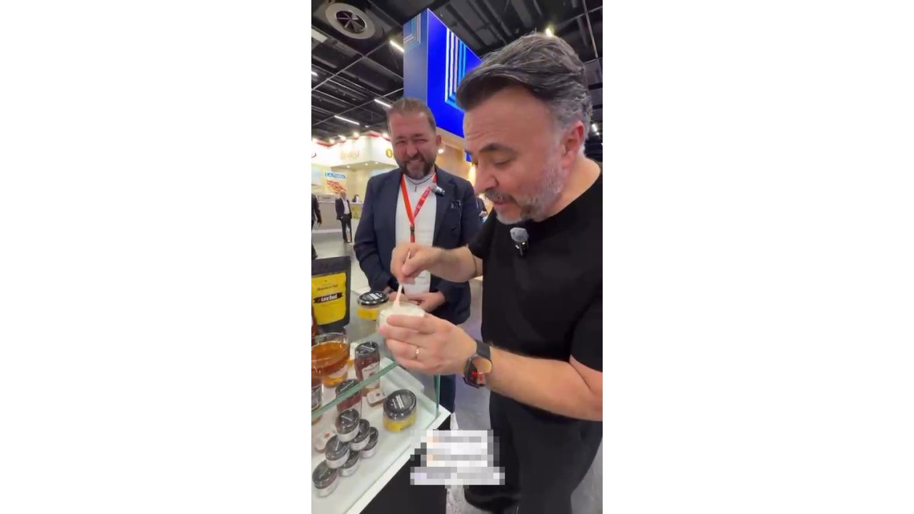 Firari Fetö’cü, Almanya’da Adana’dan Gelen Firmanın Balını Tanıttı