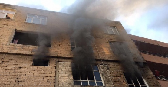 Evde çıkan yangında maddi hasar meydana geldi