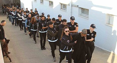 Helikopterlerin gözetiminde "Bayğaralar"çetesi adliyeye sevk edildi