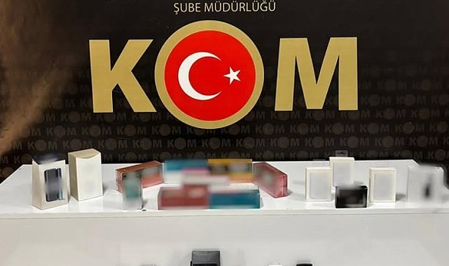 İş yerine yapılan baskında çok sayıda kaçak ürün ele geçirildi