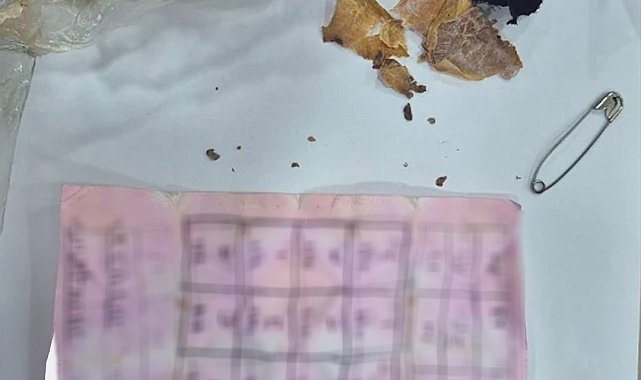 Bolu'da yapı marketin raflarının arasında muska çıktı: "Büyücülerin şerrinden Allah'a sığınırım"