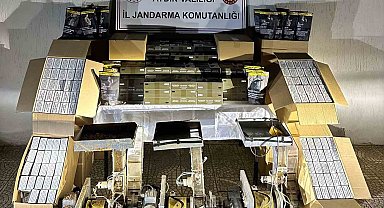 Halı yıkama dükkanı görünümlü iş yerinde kaçak sigara imalatı