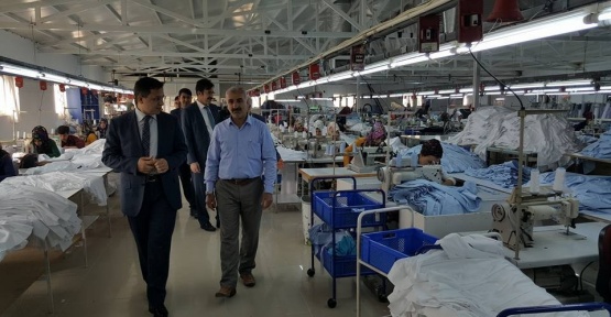 İlçe protokolü tekstilcilerle bir araya geldi